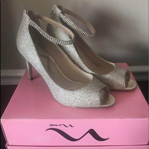 Gold Nina heels. 8 medium.